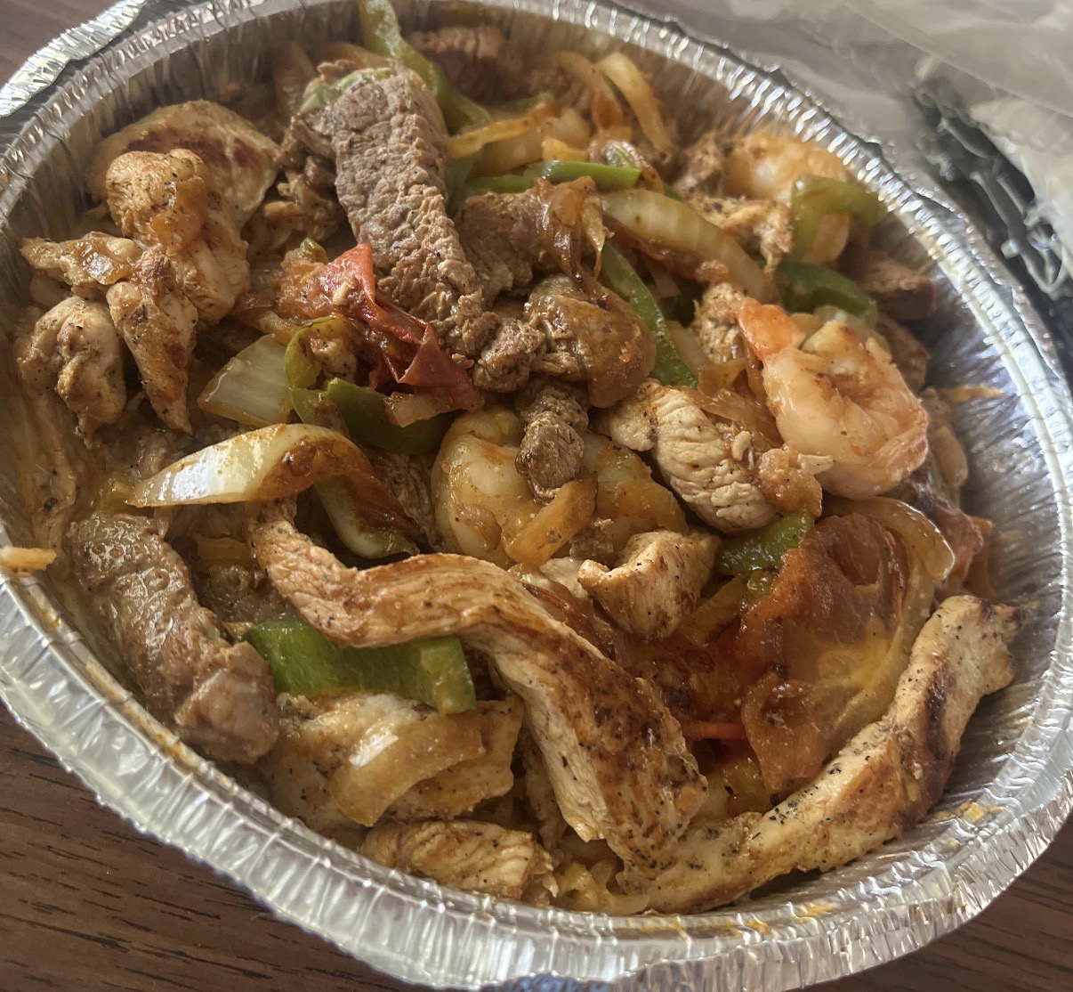 Mixed fajitas with chicken, steak and shrimp